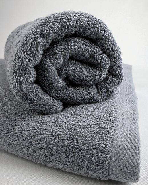 Rolled grey towel close-up